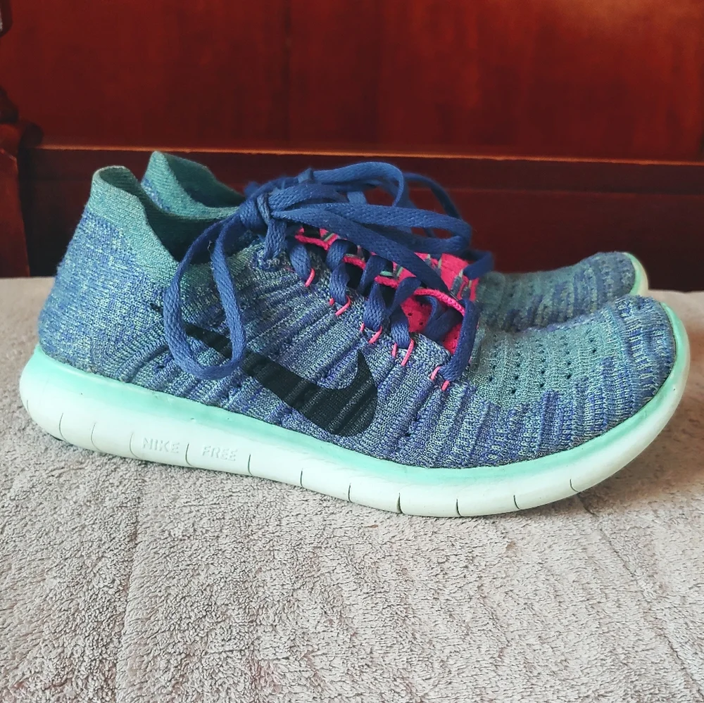 Nike Women’s Running Shoe in Purple, Pink & Teal with Black Swoosh